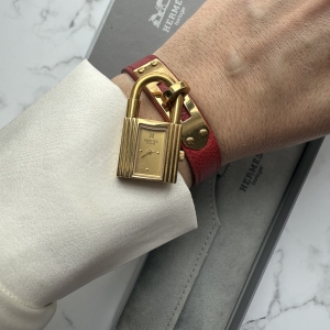 Hermès Kelly, złoty zegarek damski, w pięknym stanie w całości oryginalny + box